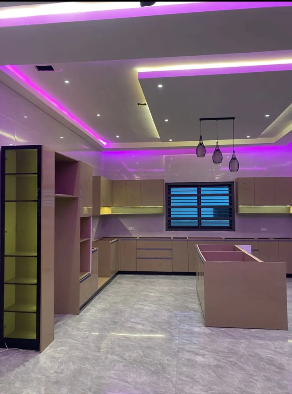 Kitchen cabinets with LED ceiling, before handover