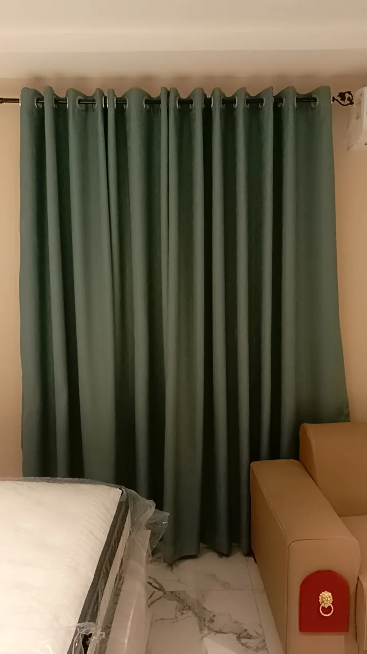 Blackout eyelet curtain in teal